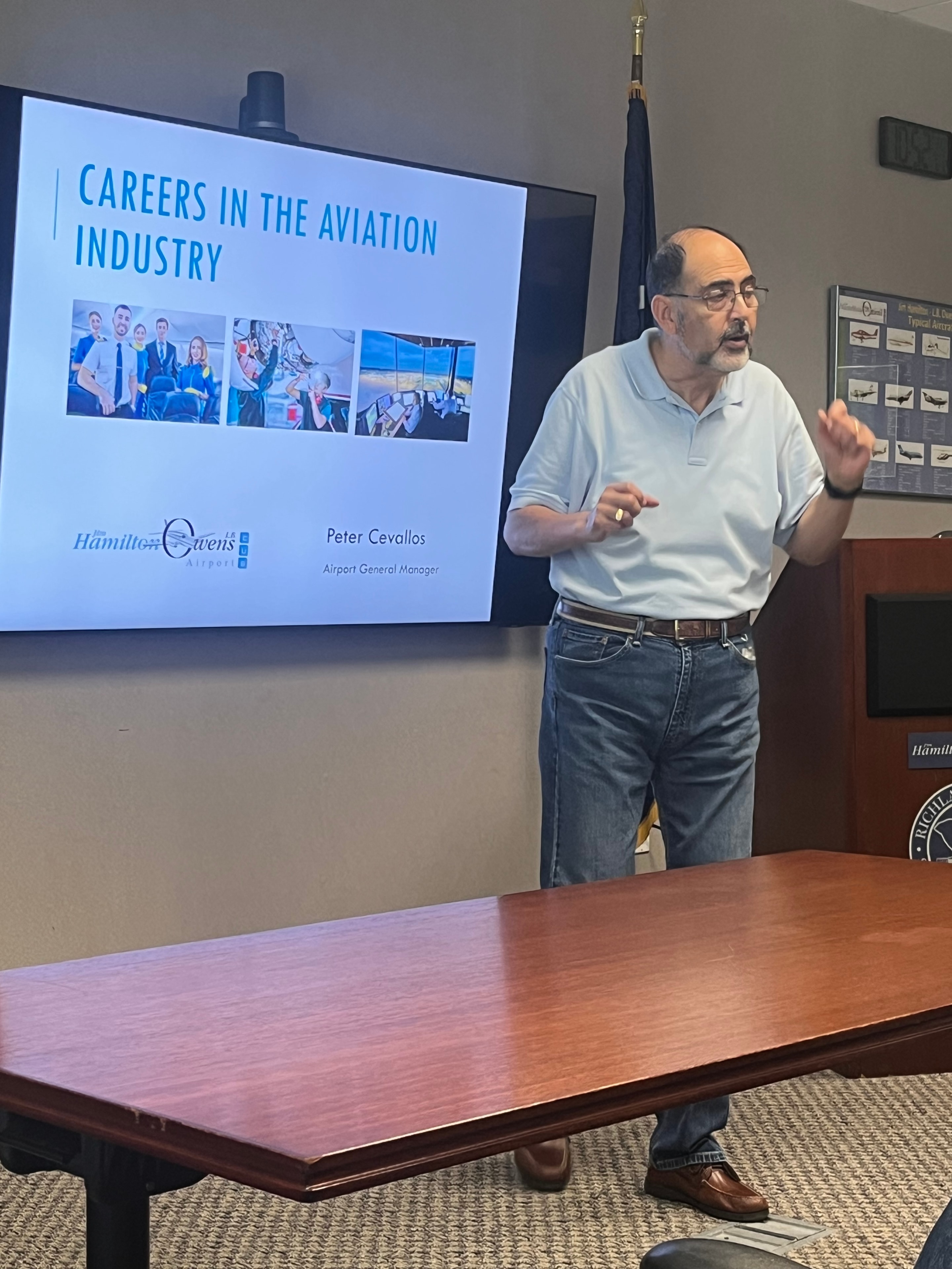 Airport General Manager presenting Careers in Aviation to Ase co-op students